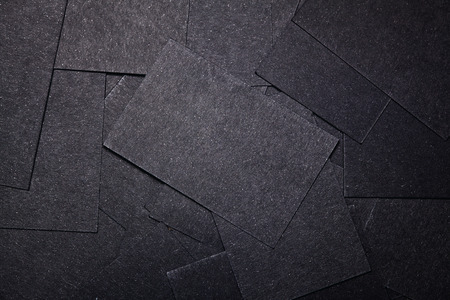 Closeup photo of black business cards on the table. Horizontalの写真素材