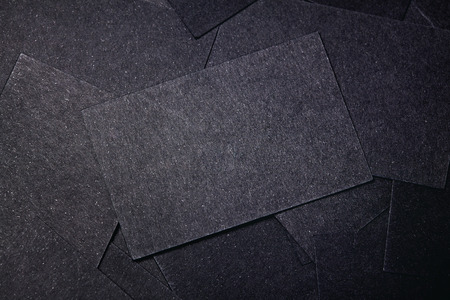 Set of black and craft business cards on natural wood table. Horizontalの写真素材