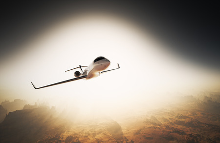 Photo White Glossy Luxury Generic Design Private Jet Flying in Sky under Earth Surface.Grand Canyon...