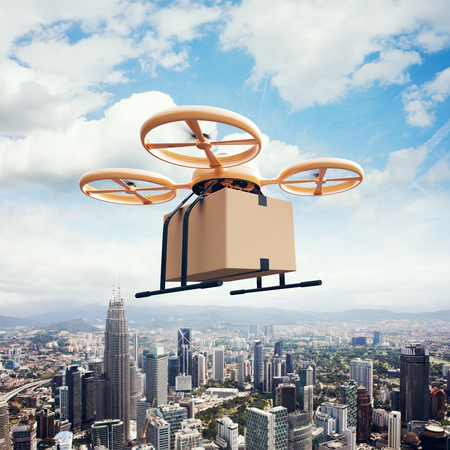 Photo Yellow Generic Design Remote Control Air Drone Flying Sky Empty Craft Box Under Urban Surface.Modern City Background.Online Goods Express Delivery.Square,Left Side View.Film Effect.3D renderingの写真素材