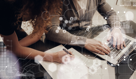 Coworkers Team Modern Office Place.Account Managers Work New Business Idea Startup Presentation.Woman Signing Contracts Pen.Laptop Computer Wood Table.HiTech Diagram Interface Screen.Conceptの写真素材