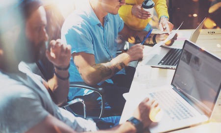 Startup Diversity Teamwork Brainstorming Meeting Concept.Business Team Coworker Global Sharing Economy Laptop.People Working Planning Start Up.Group Young Man Woman Looking Report,Modern Device Studioの写真素材