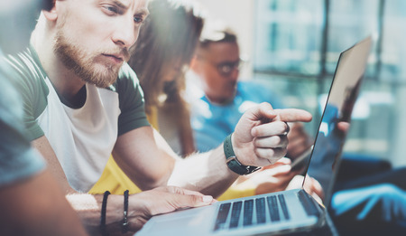 Closeup Group Young Business People Gathered Together Discussing Creative Project Process.Coworkers Brainstorm Meeting Discussion.Working Office Startup Concept.Businessman Work Modern Laptopの写真素材