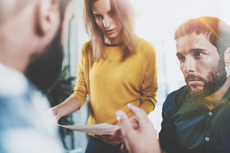 Teamwork concept.Business team sitting at meeting room and making conversations.Horizontal.Blurred background.の写真素材