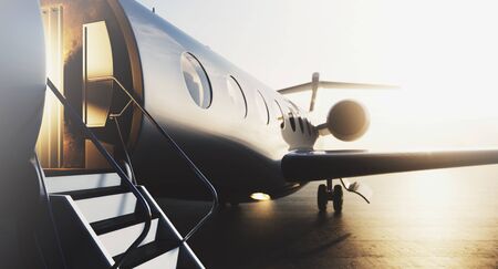 Business private jet airplane parked at terminal. Luxury tourism and business travel transportation concept. Closeup. 3d rendering.の写真素材