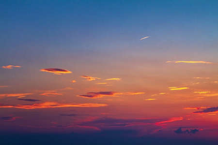 beautiful bright sunset red clouds in the blue sky