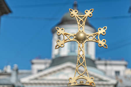Golden cross on the background of the Church.の写真素材