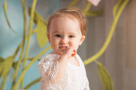 portrait of a cute little one-year-old girl.