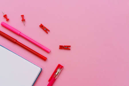 School supplies on a pink background chalkboard background ready for your design. Inscription notebookの写真素材