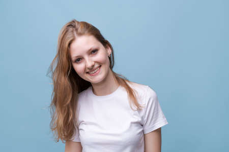 Closeup portrait her, she is beautiful, attractive and cute curious, cheerful smart girl in casual...