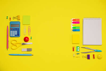 School notebook and various stationery. Back to school concept. Pencils pens and paper clips and...