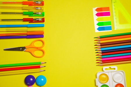 Watercolor pallet, wooden colored pencils and brushes for painting, colored pens scissors,...