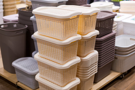 many different containers for storing various things, for organizing space and convenience at home, stand on a shelf in a storeの写真素材