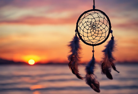 Dreamcatcher sunset sky, boho chic, ethnic amulet symbol Indigenous Peoples Day and Native Americans Dayの素材