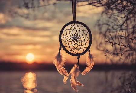 Dreamcatcher sunset sky, boho chic, ethnic amulet symbol Indigenous Peoples Day and Native Americans Dayの素材