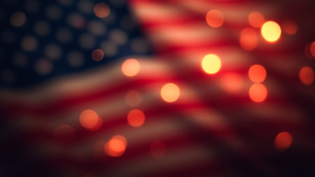 Blurry image of the American flag with red, white, and blue stripes. The flag is surrounded by a blurry backgroundの素材