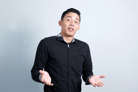 An attractive Asian man has different emotions