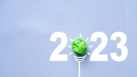 2023 Green paper bulb, new year innovative business vision and resolution concept, success concept