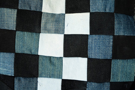 Texture of old plaid stitched jeans, fashion accessory for everyday
