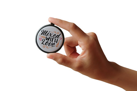 Hand holding key chain with quote mixed with love on white background on clipping path