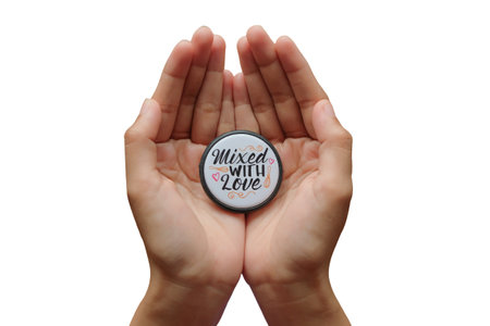 Hand holding key chain with quote mixed with love on white background on clipping pathの写真素材