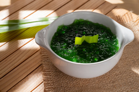 Pearl Porridge or pearl sago. Popular Indonesian desserts are commonly encountered during the month of Ramadhan. Served in a ceramic bowl with pandan leaves.の写真素材