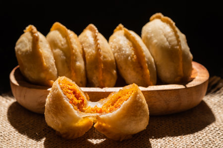 Cireng with chicken filling in a wooden bowl. Cireng is a traditional West Javanese food made from tapioca flourの写真素材