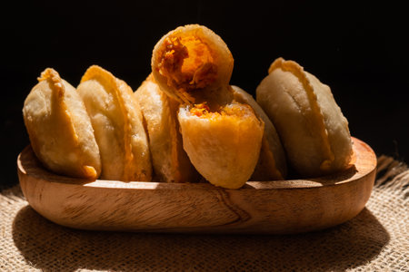 Cireng with chicken filling in a wooden bowl. Cireng is a traditional West Javanese food made from tapioca flourの写真素材