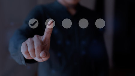 Businessman touching tick icon on virtual screen. Checklist concept