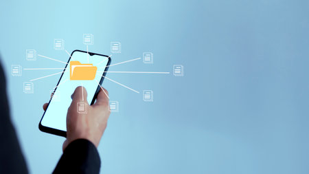 Businessman touch folder and document icon software on samrt phone, search and manage files online document database, Document management system conceptの写真素材