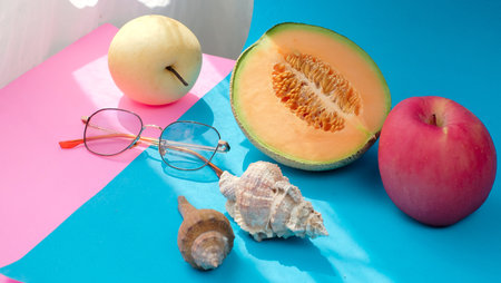 Summer blue and pink banner with fruits, glasses and sea shells. Summer vacation background...