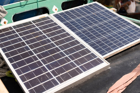 Solar panels are installed on the roofs of traditional fishing boats in Indonesia