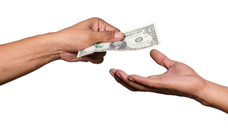 Hand giving money to another hand isolated on white background