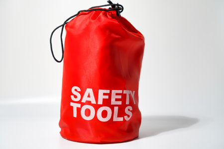 Red Safety Equipment Bag On White Backgroundの写真素材