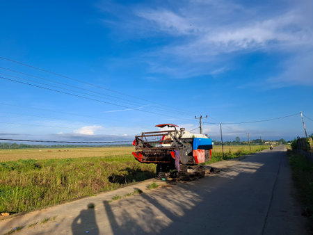 Agricultural Machinery Repair Along A Rural Road On A Sunny Dayの写真素材