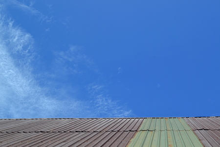 Old zinc roof, sky background