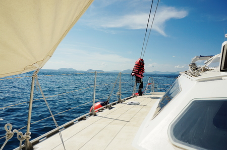 Sailboat in the calm seaの写真素材