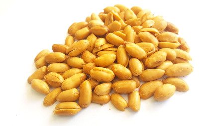 The salted peanuts on white background. The snack that cook for people eat relax motion.の写真素材