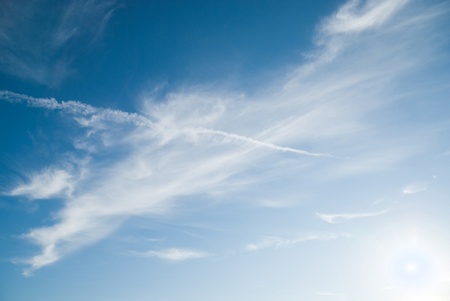 Fantastic soft white clouds against blue skyの写真素材