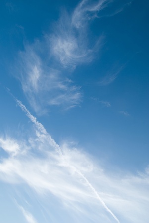 Fantastic soft white clouds against blue skyの写真素材