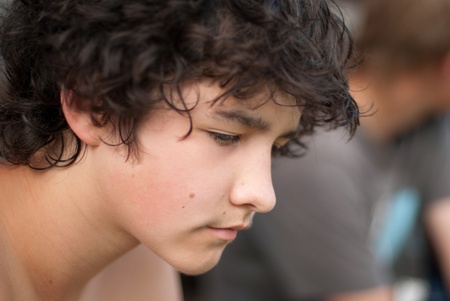 Portrait of the smiling boy with a curly hairの写真素材