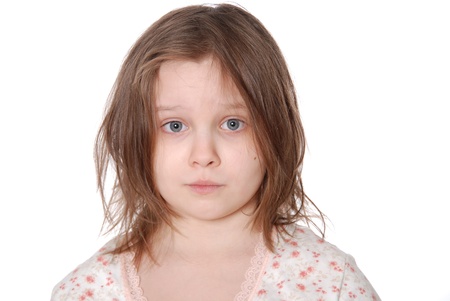Portrait of the little girl isolated on white backgroundの写真素材