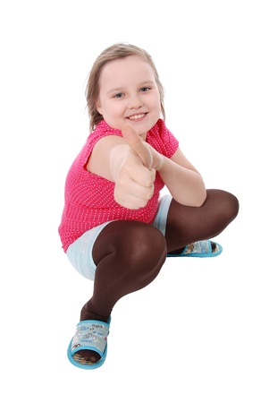  Portrait of a beautiful and confident girl showing thumbs up iso isolated on white backgroundの写真素材