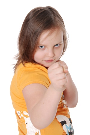 Emotional girl in a pose of the boxer isolated on white backgroundの写真素材