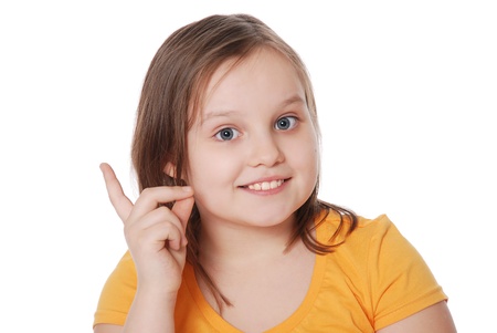 Beautiful girl shakes finger isolated on white backgroundの写真素材
