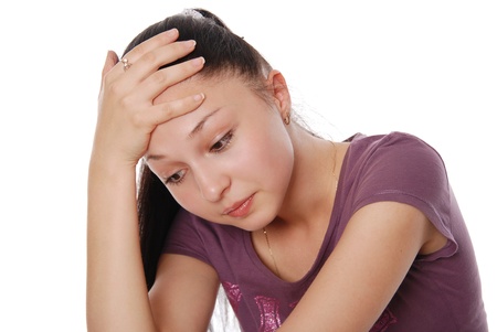 Beautiful young woman looking size in thoughtful and dreaming - white background,horisontalの写真素材