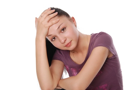Beautiful young woman looking size in thoughtful and dreaming - white background,horizontalの写真素材