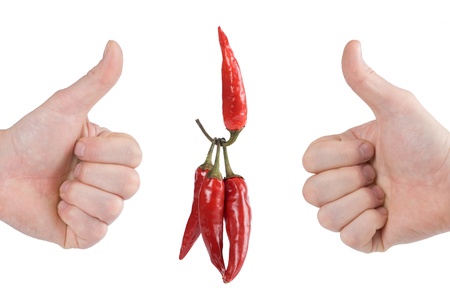 One red hot pepper lifts three pepper,isolated on white backgroundの写真素材