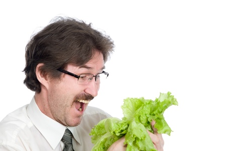 Man rejoices sheet of the salad. Isolated on white backgroundの写真素材