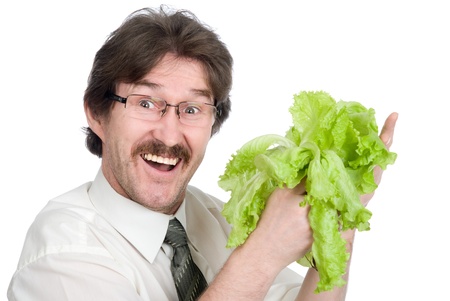 Man rejoices sheet of the salad. Isolated on white backgroundの写真素材